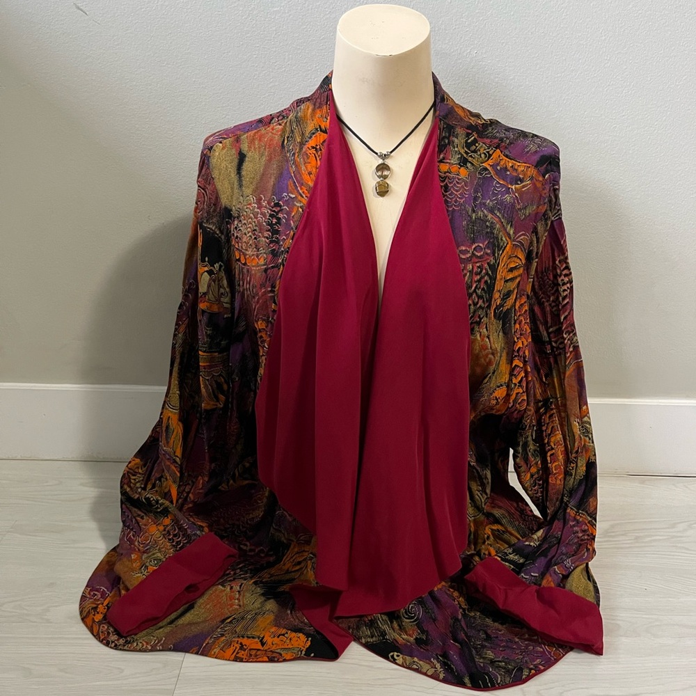 Vibrant open-front jacket features a multi-colored abstract print arstistic boho